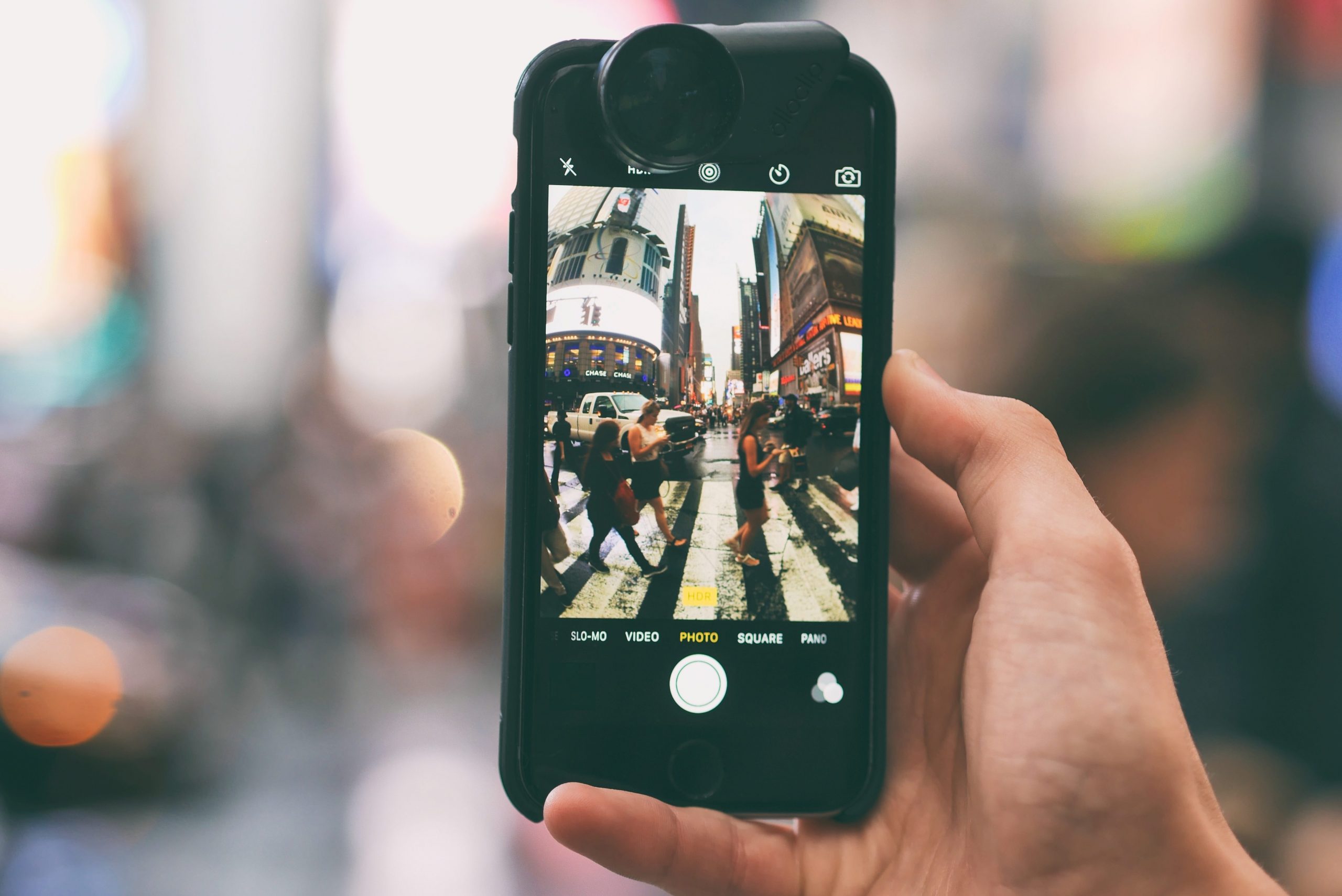 Crosswalk accident. Pedestrian with smartphone and headphones