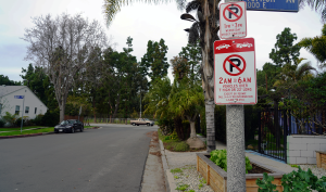Parking signs banning parking overnight for oversized vehicles.